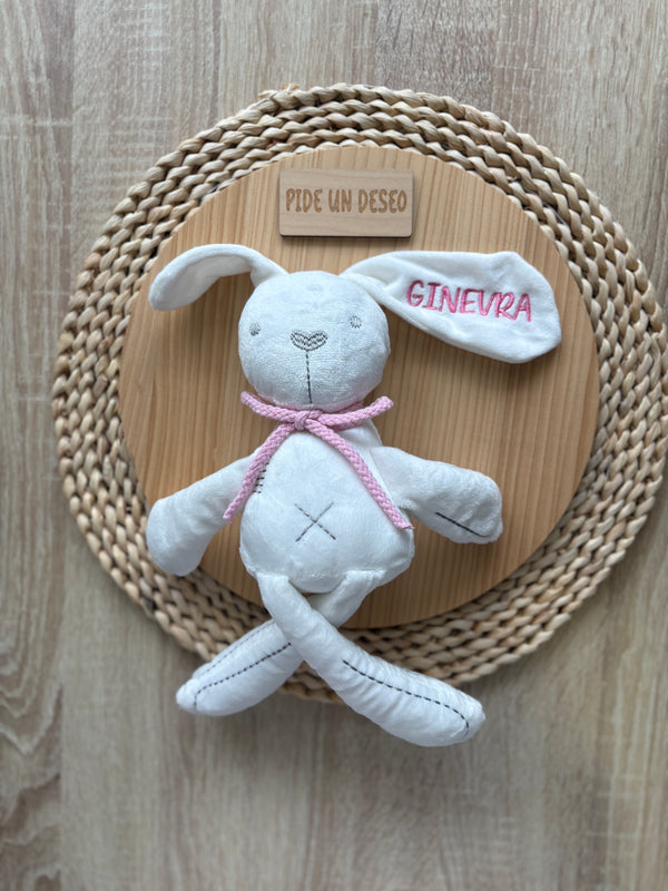 Muñeco de apego rosa