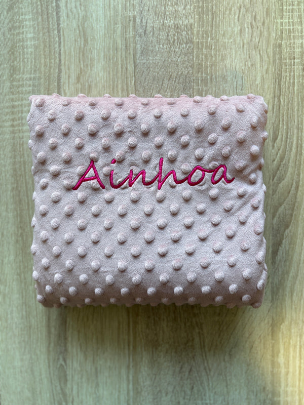 Manta rosa empolvado